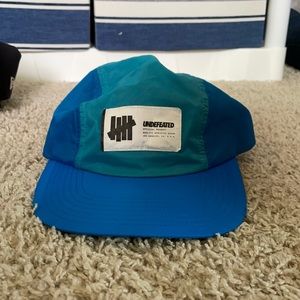 Undefeated, Camp Hat, nylon/polyester Blue, Elastic Back, Mesh Lining, New
